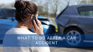 Woman calling while looking at a car accident